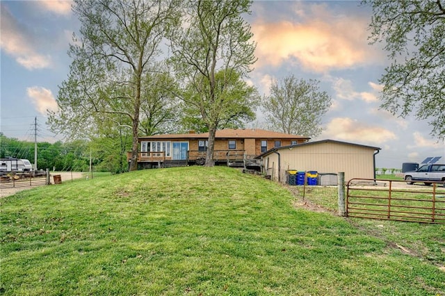 view of yard featuring fence and a deck