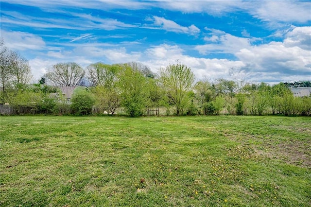 view of yard with fence
