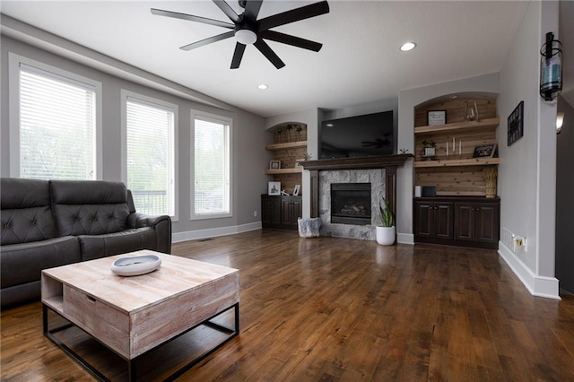 13017 Kelli Dr, Kearney, MO 64060 - living room featuring a ceiling fan, healthy amount of natural light, baseboards, dark wood-style flooring, and recessed lighting