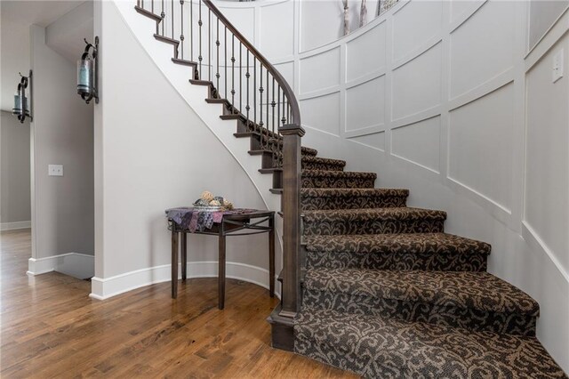 13017 Kelli Dr, Kearney, MO 64060 - stairs with wood finished floors and baseboards
