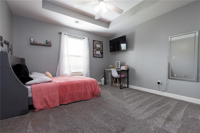 13017 Kelli Dr, Kearney, MO 64060 - bedroom featuring carpet, a tray ceiling, baseboards, and a ceiling fan