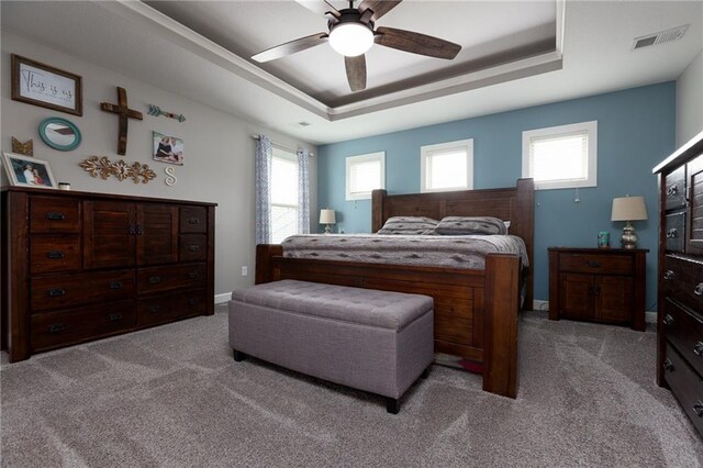 13017 Kelli Dr, Kearney, MO 64060 - carpeted bedroom featuring a raised ceiling, a ceiling fan, and baseboards