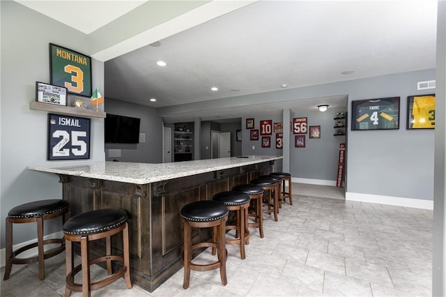 13017 Kelli Dr, Kearney, MO 64060 - indoor bar with baseboards and recessed lighting