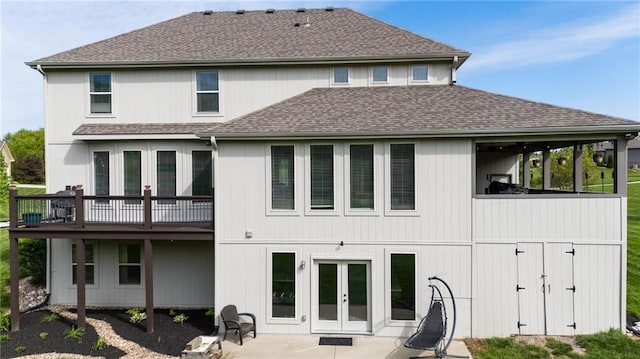 13017 Kelli Dr, Kearney, MO 64060 - back of property with french doors, roof with shingles, a patio area, and a deck
