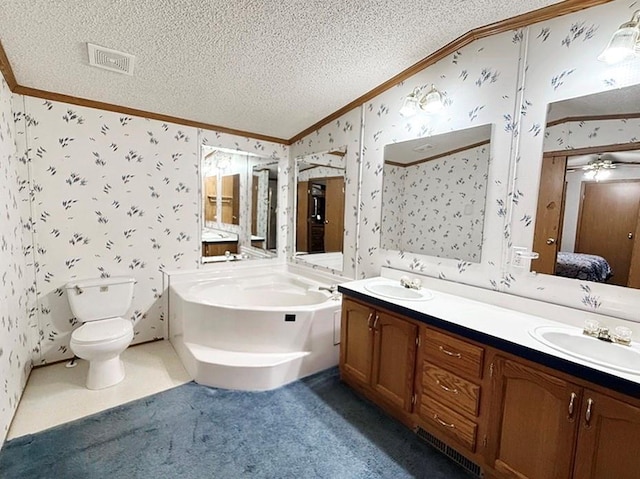 bathroom featuring ornamental molding, a textured ceiling, a sink, and wallpapered walls