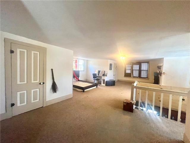 basement featuring carpet flooring