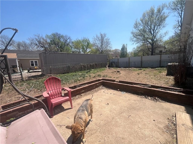 view of yard featuring a fenced backyard and a patio area