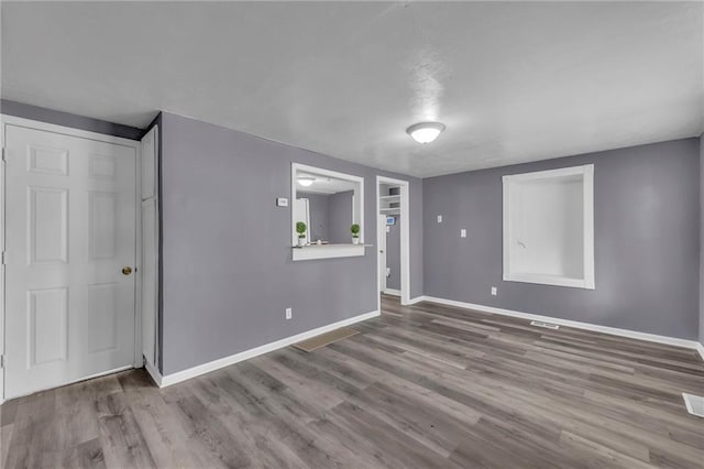 5315 Hardy Ave, Raytown, MO 64133 - interior space featuring baseboards, wood finished floors, and visible vents