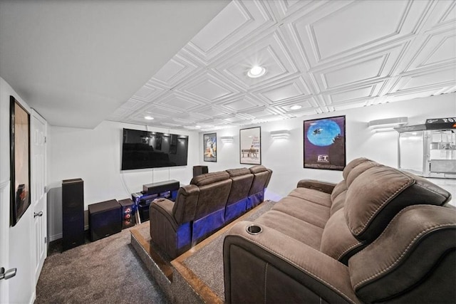 cinema featuring an ornate ceiling, recessed lighting, and baseboards