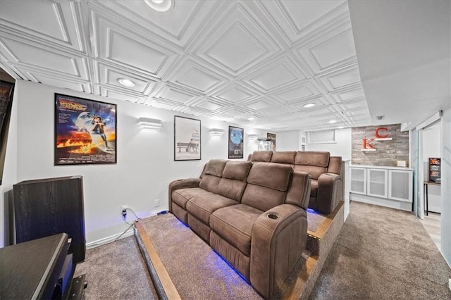 home theater featuring an ornate ceiling, recessed lighting, and carpet