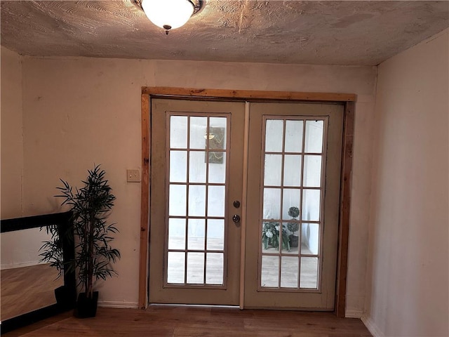 300 W Sea Ave, Independence, MO 64050 - doorway to outside with wood finished floors, french doors, and baseboards