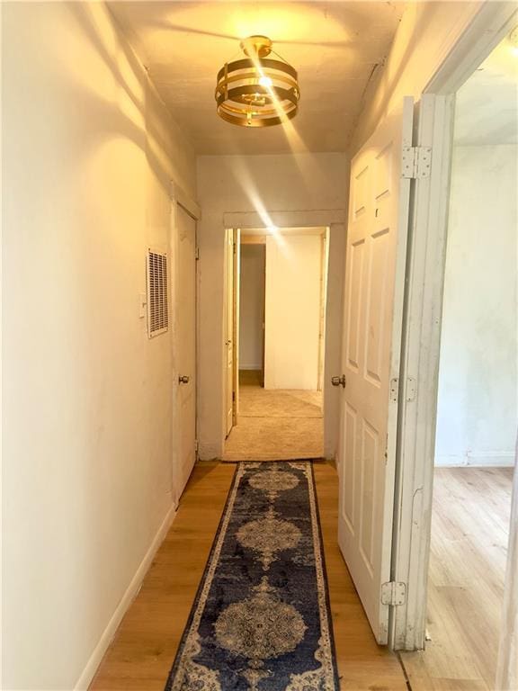 300 W Sea Ave, Independence, MO 64050 - corridor with visible vents and light wood-type flooring