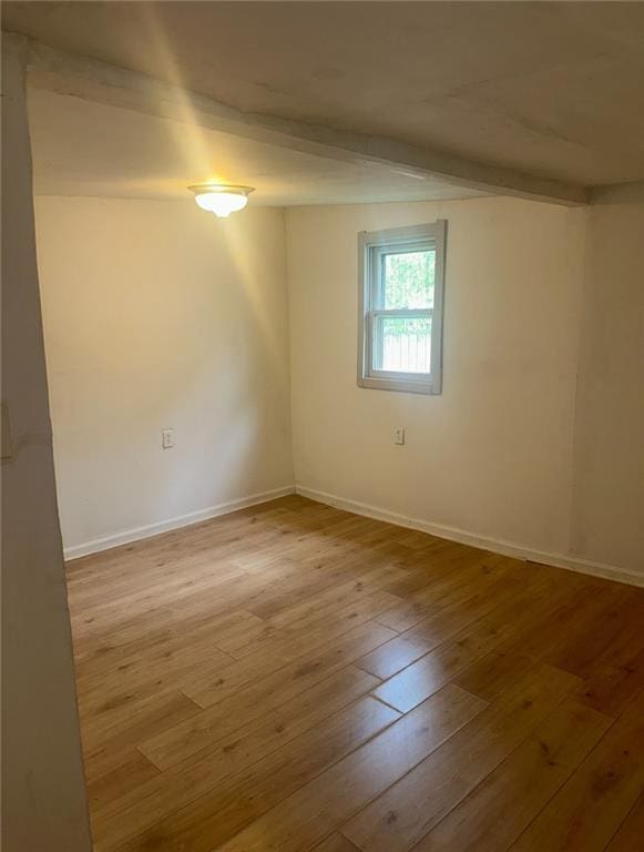 300 W Sea Ave, Independence, MO 64050 - spare room with hardwood / wood-style flooring and baseboards