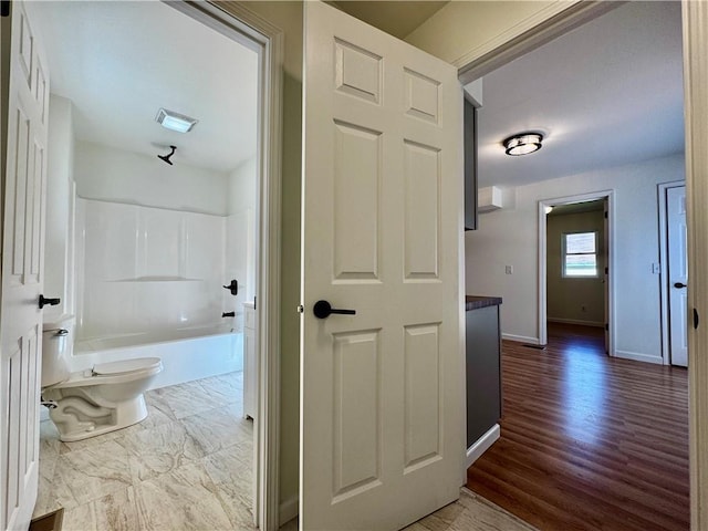 1502 6th Ave, Saint Joseph, MO 64505 - hall with baseboards, dark wood finished floors, and visible vents