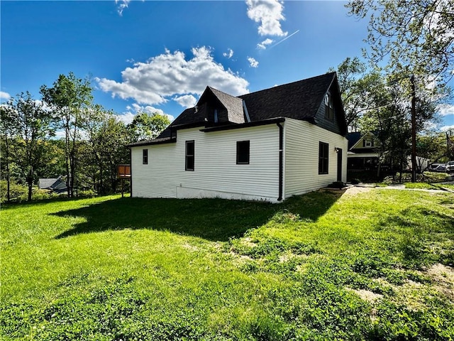 1502 6th Ave, Saint Joseph, MO 64505 - view of home's exterior with a yard and roof with shingles