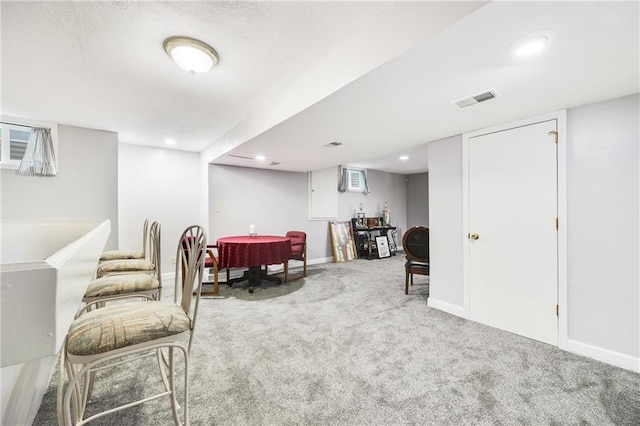 living area with baseboards, carpet flooring, recessed lighting, and visible vents