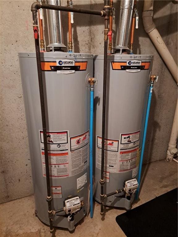 6715 NW 102nd Ter, Kansas City, MO 64154 - utility room featuring water heater