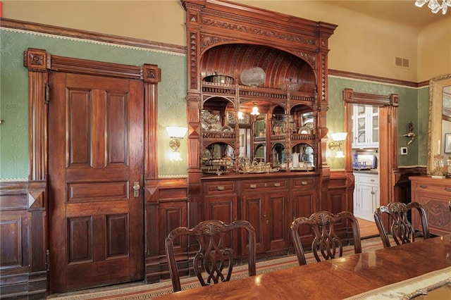 bar featuring visible vents