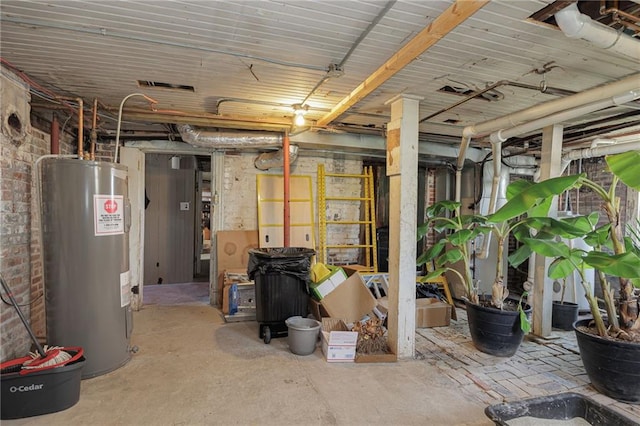 unfinished basement featuring visible vents and water heater