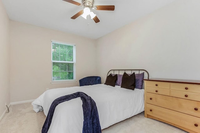 17525 W 111th Ct, Olathe, KS 66061 - bedroom with light colored carpet, baseboards, and ceiling fan