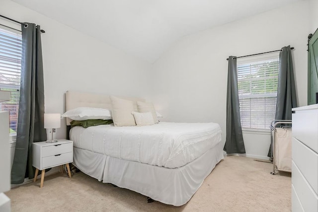 17525 W 111th Ct, Olathe, KS 66061 - bedroom featuring light carpet, vaulted ceiling, and baseboards