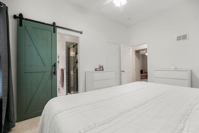 17525 W 111th Ct, Olathe, KS 66061 - carpeted bedroom featuring a barn door and ceiling fan