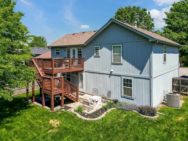 17525 W 111th Ct, Olathe, KS 66061 - back of house featuring central AC unit, a deck, a patio, stairs, and a shingled roof