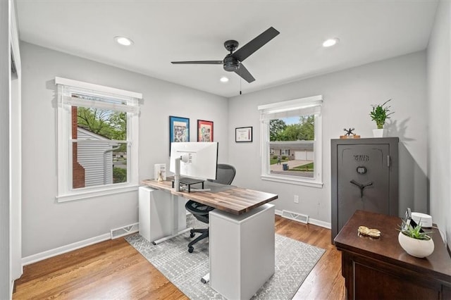 office area with recessed lighting, ceiling fan, visible vents, and light wood-style flooring