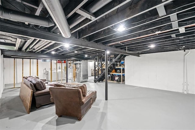basement with stairway and heating unit