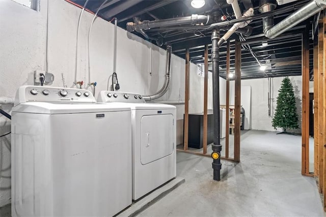 laundry area featuring independent washer and dryer and laundry area
