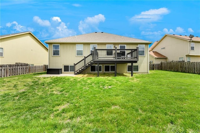 2136 Alder St, Leavenworth, KS 66048 - rear view of property with a fenced backyard, stairs, a yard, and a deck