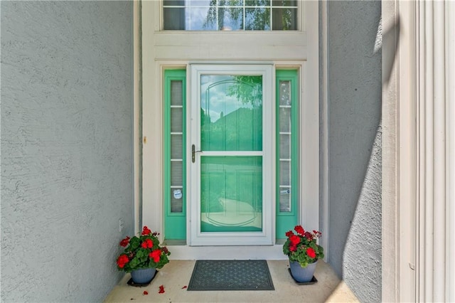 9800 W 147th St, Overland Park, KS 66221 - view of exterior entry with stucco siding