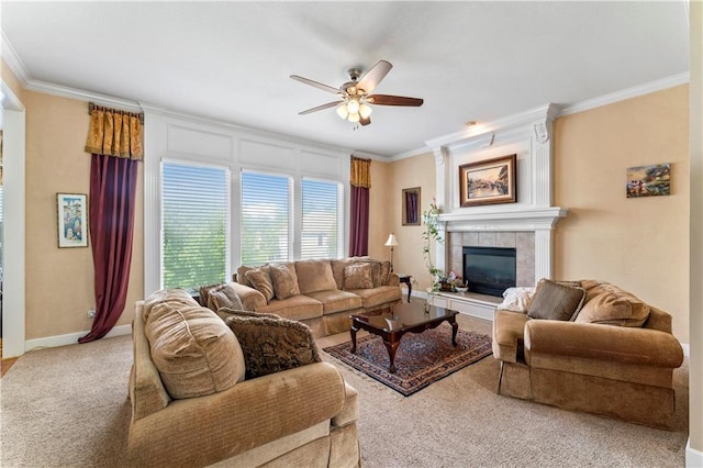 9800 W 147th St, Overland Park, KS 66221 - carpeted living room with crown molding, a ceiling fan, and a tiled fireplace