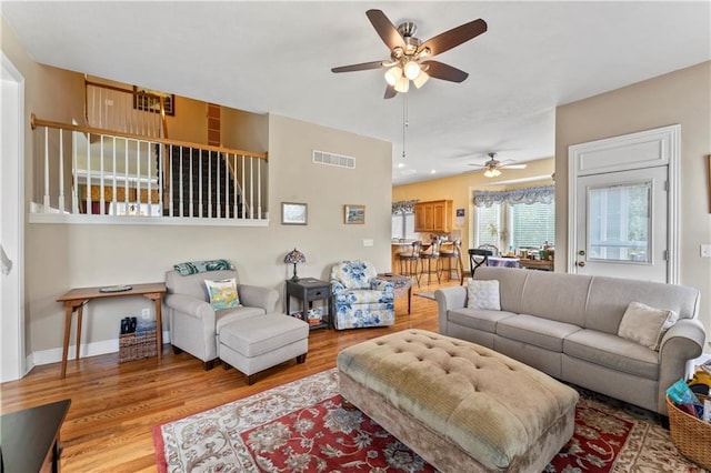 9800 W 147th St, Overland Park, KS 66221 - living area with a ceiling fan and wood finished floors