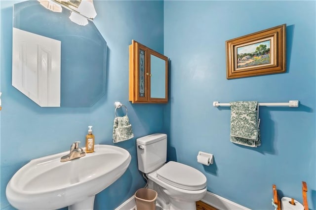 9800 W 147th St, Overland Park, KS 66221 - half bathroom with a sink and toilet