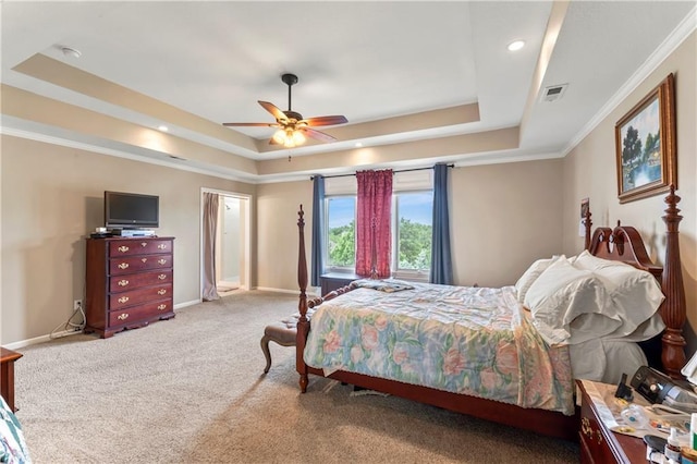9800 W 147th St, Overland Park, KS 66221 - carpeted bedroom with a raised ceiling, recessed lighting, ceiling fan, and crown molding