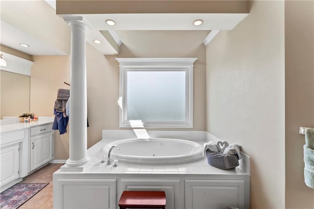 9800 W 147th St, Overland Park, KS 66221 - full bathroom with a whirlpool tub, vanity, ornate columns, and tile patterned flooring