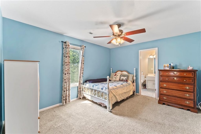 9800 W 147th St, Overland Park, KS 66221 - carpeted bedroom with ensuite bathroom and ceiling fan