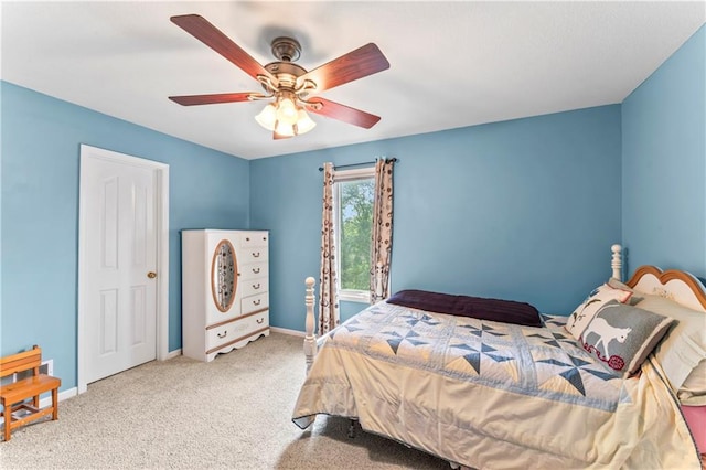 9800 W 147th St, Overland Park, KS 66221 - carpeted bedroom with baseboards and a ceiling fan