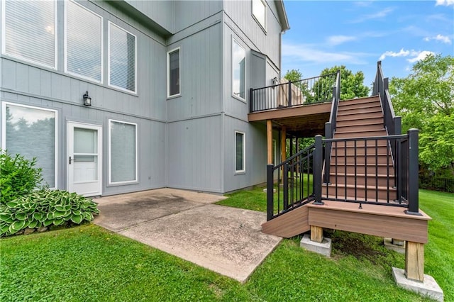 9800 W 147th St, Overland Park, KS 66221 - back of house featuring stairs, a yard, a patio area, and a deck