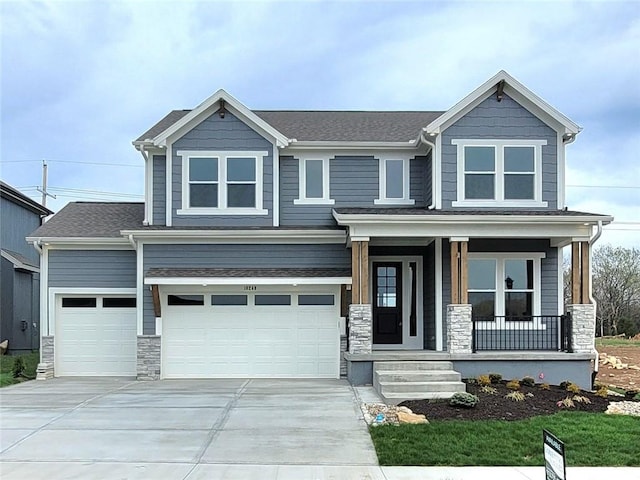 craftsman-style home featuring a porch, a garage, stone siding, roof with shingles, and concrete driveway