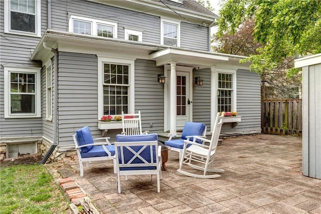 view of patio featuring fence