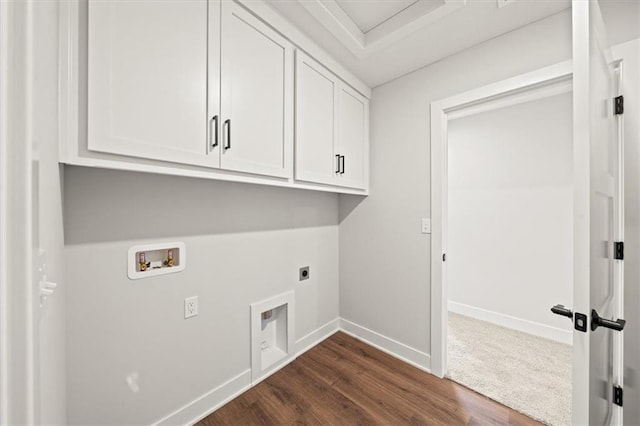 laundry area with baseboards, hookup for a washing machine, dark wood-style floors, electric dryer hookup, and cabinet space