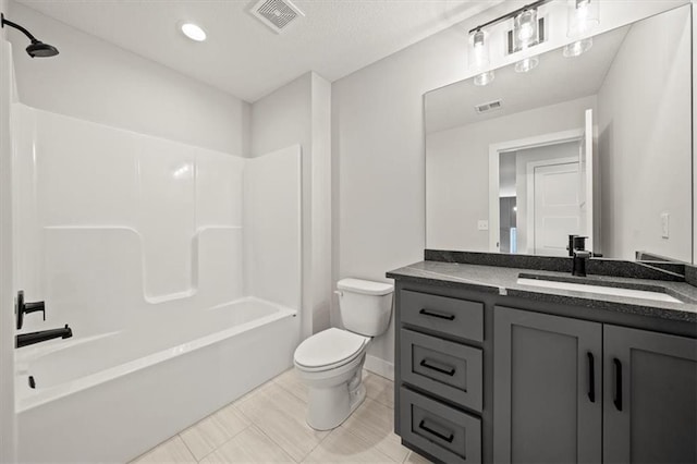 bathroom with vanity, toilet, bathing tub / shower combination, and visible vents
