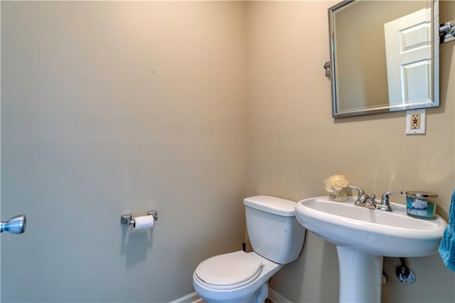 20534 W 199th Ter, Spring Hill, KS 66083 - bathroom featuring toilet and baseboards