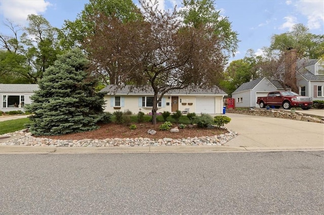 view of front of home featuring an attached garage and driveway