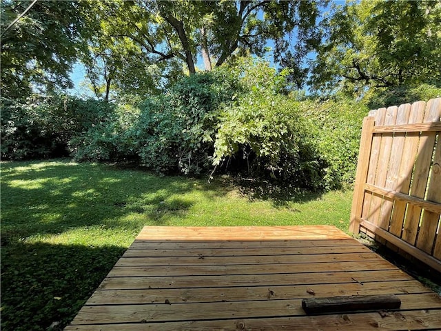 deck featuring a lawn