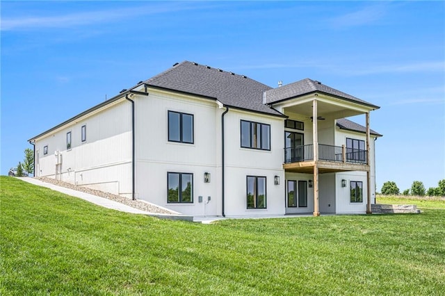 10075 NW Hillsboro Rd, Platte City, MO 64079 - rear view of house with a balcony, a yard, and roof with shingles