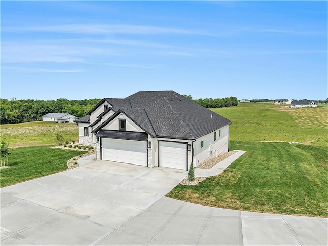 10075 NW Hillsboro Rd, Platte City, MO 64079 - view of front of house with a front yard, a garage, driveway, and roof with shingles