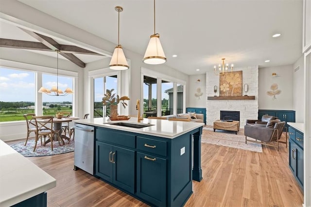 17163 S Laurelwood St, Olathe, KS 66062 - kitchen with a chandelier, dishwasher, a sink, healthy amount of natural light, and recessed lighting
